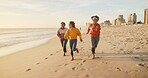 Friends, beach and running together on sand, outdoor freedom and weekend trip to ocean waves. Women, people and travel to sea with energy for adventure, race and bonding games on holiday in Egypt