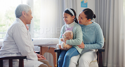 Buy stock photo Pediatrician, child and mother at hospital consultation with help of mature woman and teddy with health check. Smile, clinic and healthcare with exam, young girl and wellness with family doctor