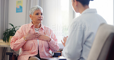 Buy stock photo Doctor, consultation and elderly woman with chest pain for heart disease, advice and medical checkup. Healthcare, patient and worker with discussion for cardiac arrhythmia, palpitations and diagnosis