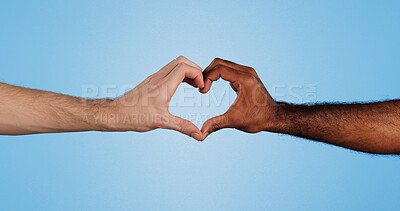 Buy stock photo Heart, sign and hands of people in studio for solidarity, diversity and collaboration together in community. Finger, emoji and team with love icon, gesture or symbol for support on blue background