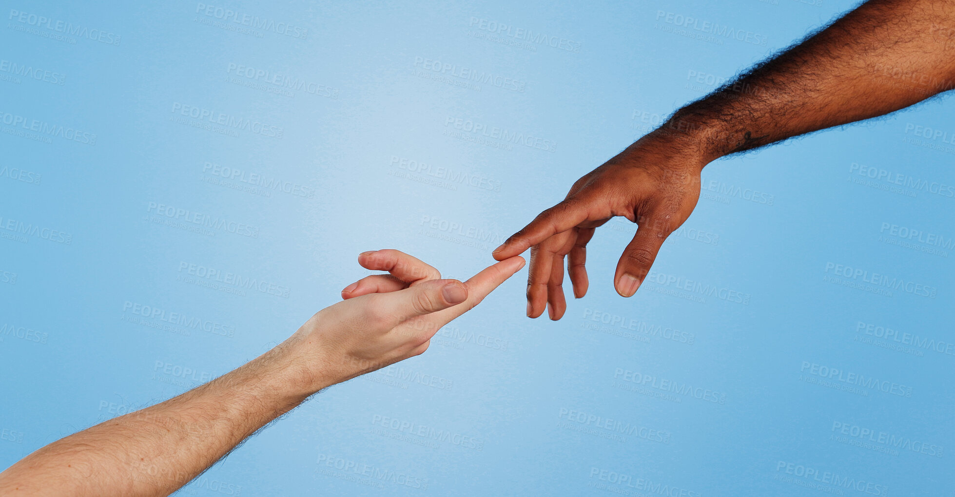 Buy stock photo Hands, touch and reaching of people in studio with support, faith and spiritual symbol. Hope, community and helping with trust, connection and partnership with kindness and care with blue background