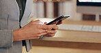Office, phone and hands of business person at night for networking, typing email and online research. Professional, corporate and worker on smartphone for website, internet and communication  