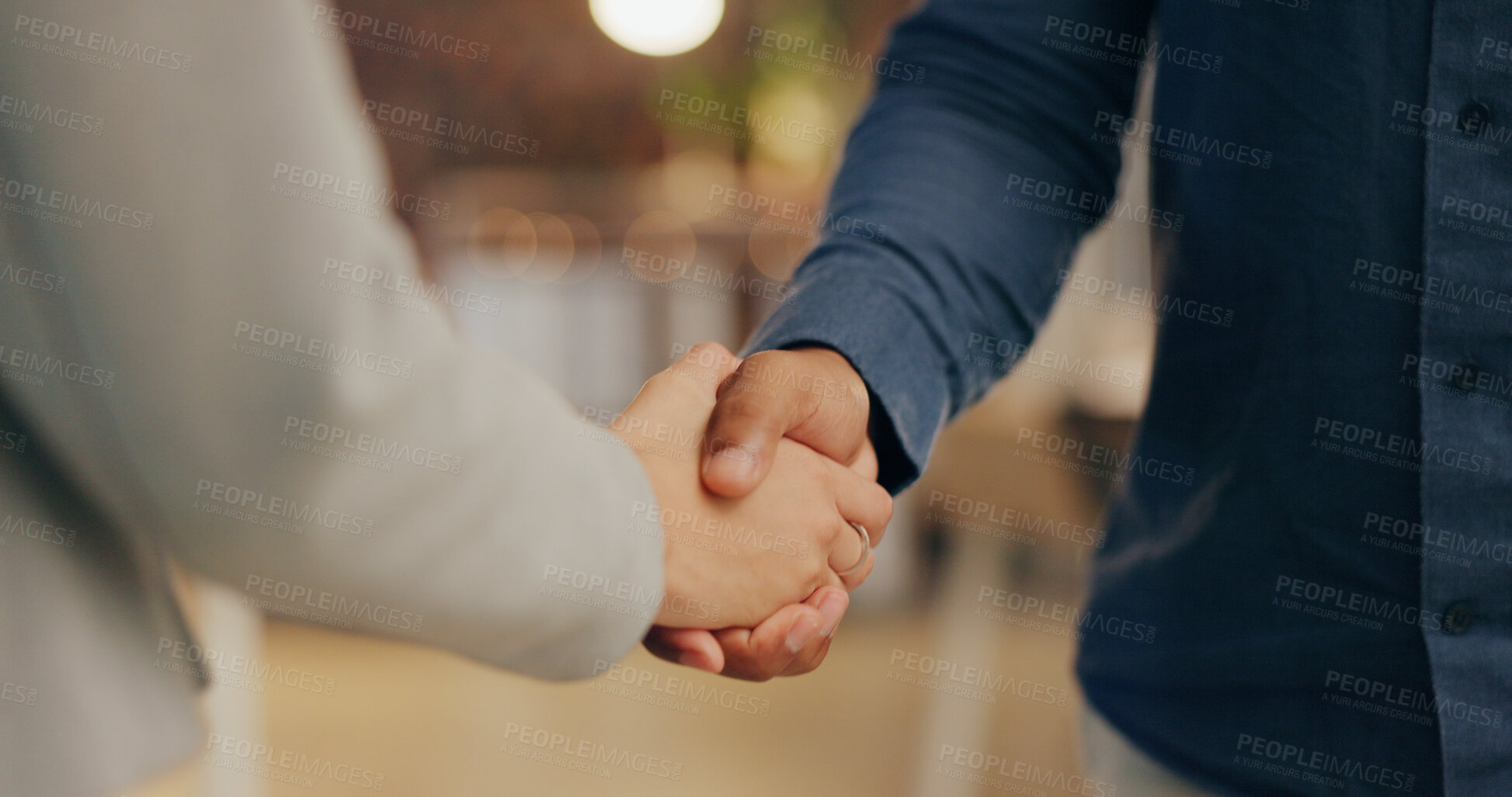 Buy stock photo Night, office and business people in handshake for deal, agreement or collaboration at creative agency. Welcome, introduction and team shaking hands in partnership, project success or congratulations