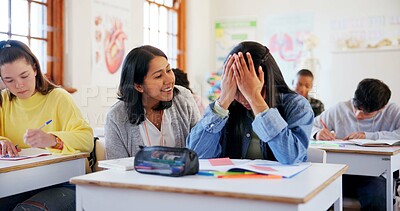 Buy stock photo Frustrated girl, student and stress with teacher for support, comfort or assistance in test, exam or classroom assessment. Young, female person or teenager with help for anxiety, nerves or assignment