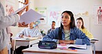 Girl, student or teacher with exam results, test or paper for moderation, examination or assessment at school. Young, female person or learner with document for academic evaulation or classroom score