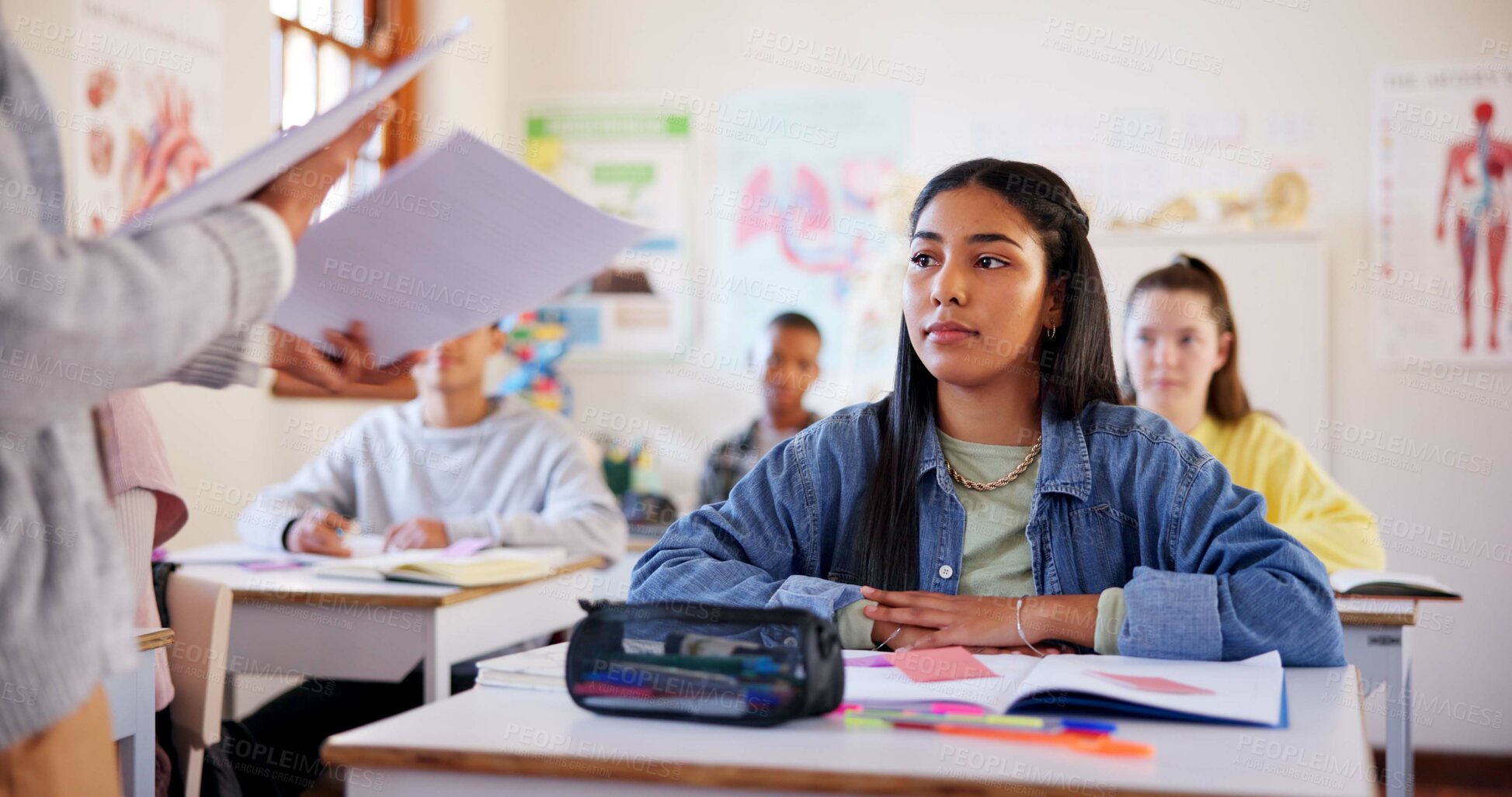 Buy stock photo Girl, student or teacher with exam results, test or paper for moderation, examination or assessment at school. Young, female person or learner with document for academic evaluation or classroom score