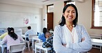 Teacher, portrait and arms crossed in classroom with students for education, lesson or scholarship. Educator, woman or happy at school for teaching children, learning support or confidence at academy