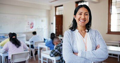 Buy stock photo Teacher, portrait and arms crossed in classroom with students for education, lesson or scholarship. Educator, woman or happy at school for teaching children, learning support or confidence at academy