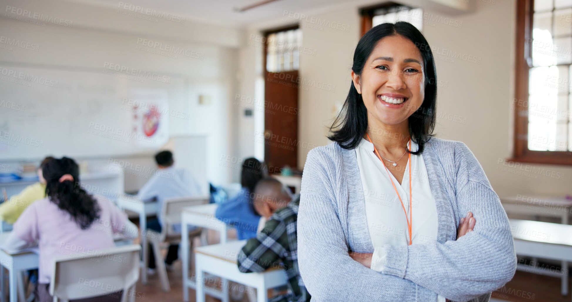 Buy stock photo Teacher, portrait and arms crossed in classroom with students for education, lesson or scholarship. Educator, woman or happy at school for teaching children, learning support or confidence at academy