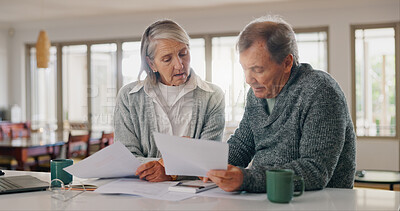 Buy stock photo Senior couple, documents and budget planning with finance for pension, investment or expenses at home. Elderly, man and woman with paperwork for bills, funding or payments together on table at house