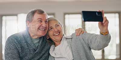 Buy stock photo Senior couple, selfie and hug in home, photography and online for social media post in living room. Elderly people, happy and embrace for security in relationship, love and profile picture for memory