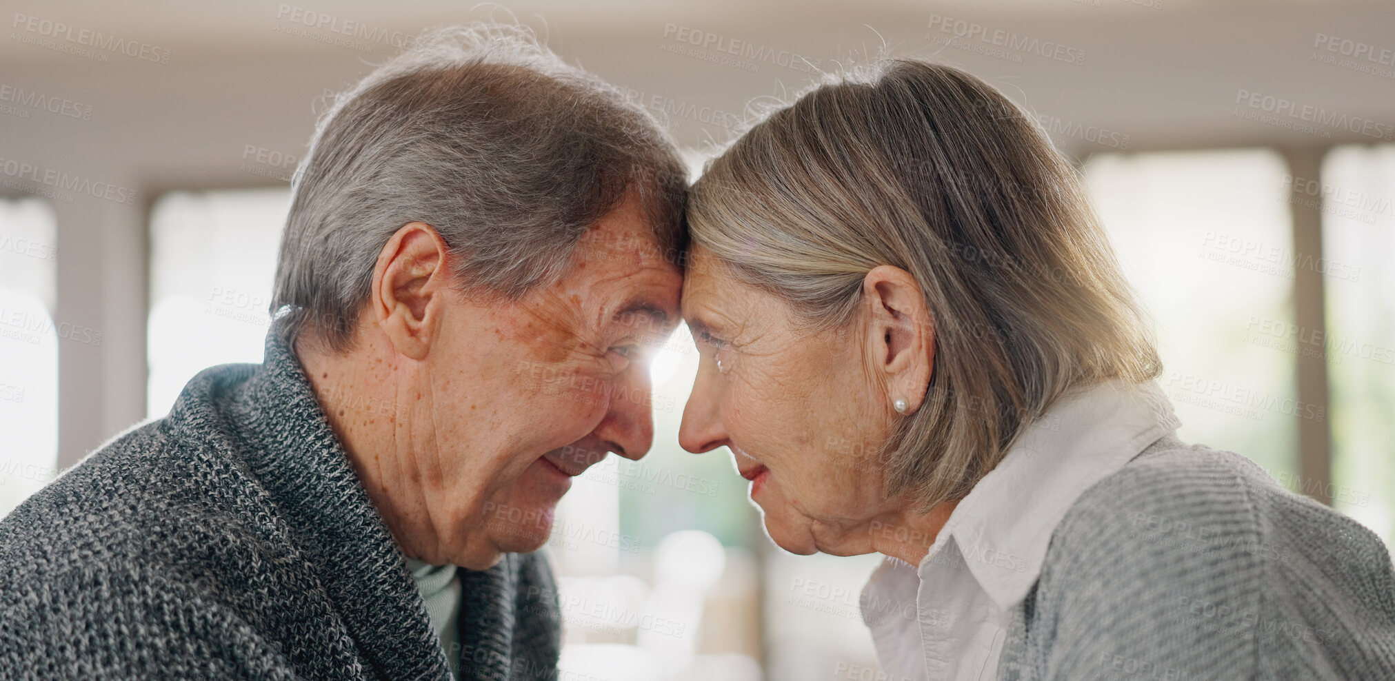 Buy stock photo Sweet, love and senior couple in home for bonding, romance and marriage with support and hug. Quality time, happy and elderly man and woman in retirement embracing for connection and care at house.