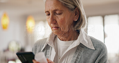 Buy stock photo Senior woman, pills and phone in home for reading side effects, benefit or allergies in retirement. Elderly person, smartphone and check for medicine, drugs or supplements with research on mobile app