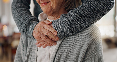 Buy stock photo Hands, embrace and senior man with wife in home for comfort, bonding and love in marriage together. Care, empathy and closeup of elderly person hugging woman for connection in relationship at house.