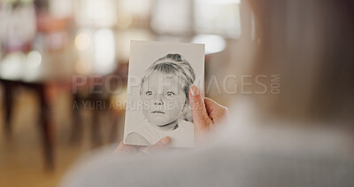 Buy stock photo Hand, history and senior woman with picture frame for mourning, loss or grief with history in house. Comfort, nostalgia and elderly female person with photo for reflection or remembrance in home.