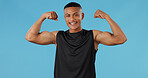 Black man, flex arms and portrait in studio for growth, muscle or fitness by blue background. African person, model or bodybuilder with smile, strong or development for wellness with results in Kenya