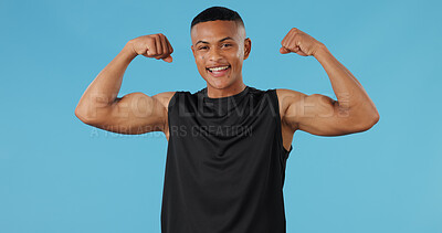 Buy stock photo Black man, flex arms and portrait in studio for growth, muscle or fitness by blue background. African person, model or bodybuilder with smile, strong or development for wellness with results in Kenya