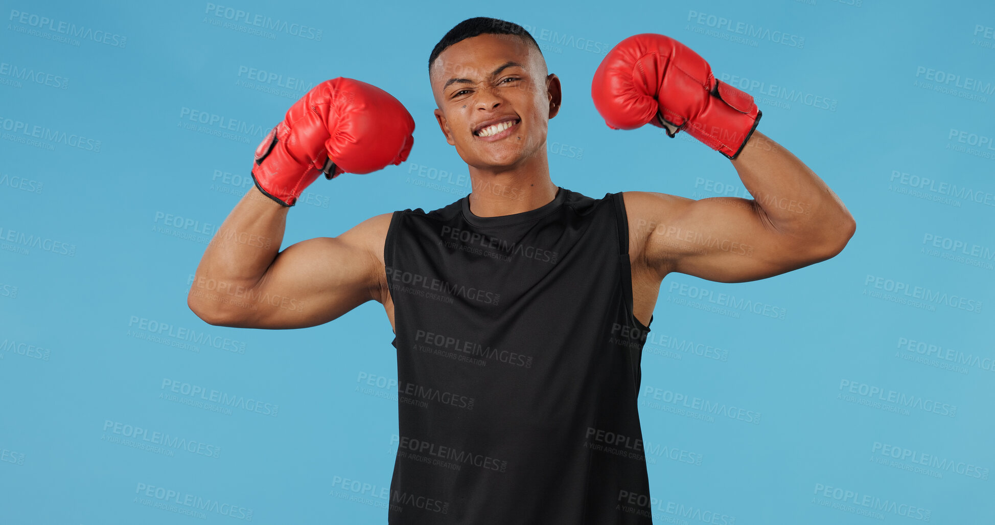 Buy stock photo Man, flex and portrait in studio for box, fight and muay thai with exercise, battle and competition. Boxer, face and strong athlete on blue background for training, fitness and workout with mma sport