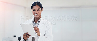 Buy stock photo Portrait of a young female scientist working in a lab