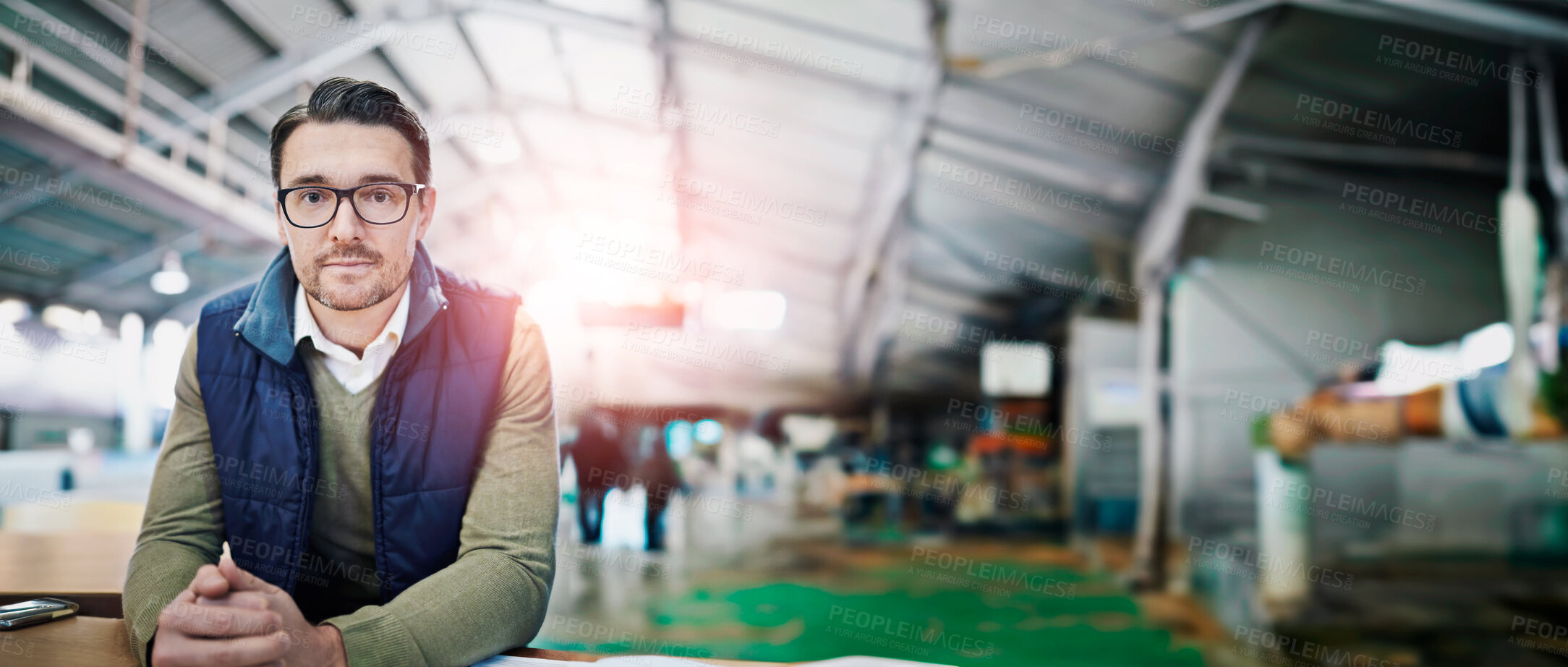 Buy stock photo Portrait, supervisor and businessman in logistics at factory with machines for supply chain. Mature man, warehouse and table with paperwork for stock take in manufacturing and distribution business 