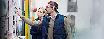 Buy stock photo People, planning and checking schedule with board in warehouse with calendar for order details. Man, woman and together with checklist or clipboard for supplier information and inventory updates