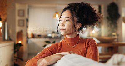 Buy stock photo Boredom, face and thinking with woman on sofa in living room of home, planning for future. Idea, mindfulness and vision with serious African person in apartment to relax on weekend for wellness