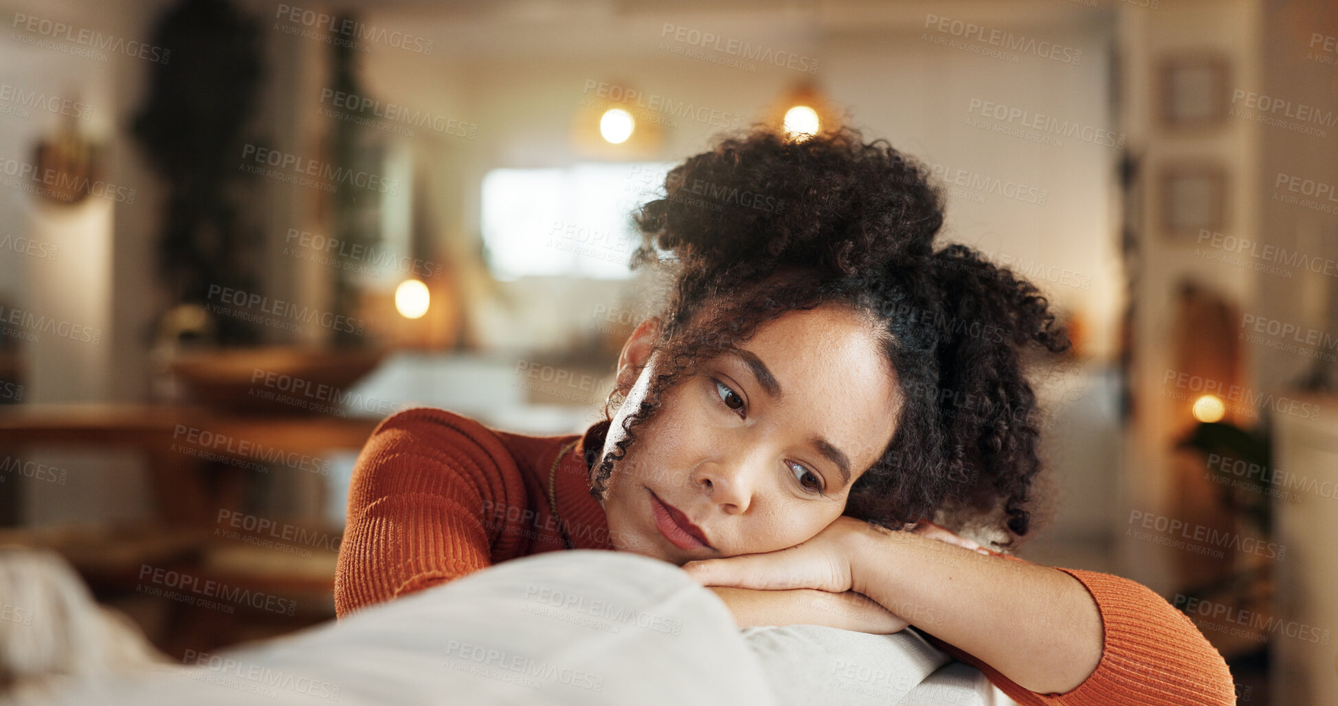 Buy stock photo Heartbreak, sad and thinking with face of woman on sofa in living room of home for contemplation. Bored, depression and lonely with unhappy African person in apartment for breakup or separation