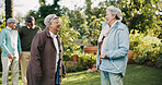 Nature, conversation and senior women outdoor in garden at retirement home for bonding together. Happy, communication and elderly female people in discussion at park with connection in friendship.