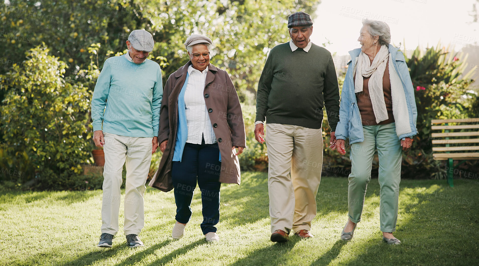 Buy stock photo Senior people, together and bonding in retirement home as pensioners for activity, walking or relax. Group, elderly care and friends for outdoor, garden or backyard in nursing village or community