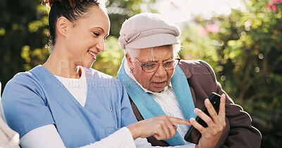 Buy stock photo Outdoor, nurse and old woman with smartphone, help and conversation with digital app. Pensioner, caregiver and senior lady in park, cellphone or mobile user with connection, network and communication