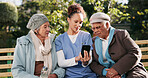 Friends, phone and nurse with old women on park bench for assisted living, communication or healthcare. Conversation, medical or trust with senior people and caregiver outdoor in nature to explain