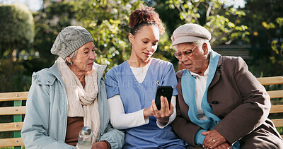 Buy stock photo Friends, phone and nurse with old women on park bench for assisted living, communication or healthcare. Conversation, medical or trust with senior people and caregiver outdoor in nature to explain