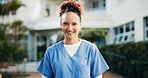 Woman, nurse or outdoor for portrait with smile, confidence or elderly care at nursing home. Caregiver, happy or healthcare professional at entrance for welcome, friendly service or career in Brazil