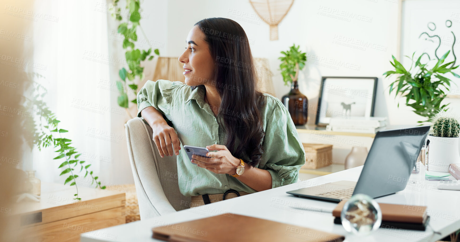 Buy stock photo Phone, thinking and woman at desk in home office with laptop, smile and inspiration for freelance project. Remote work, relax and girl with smartphone for online chat, connectivity and business ideas