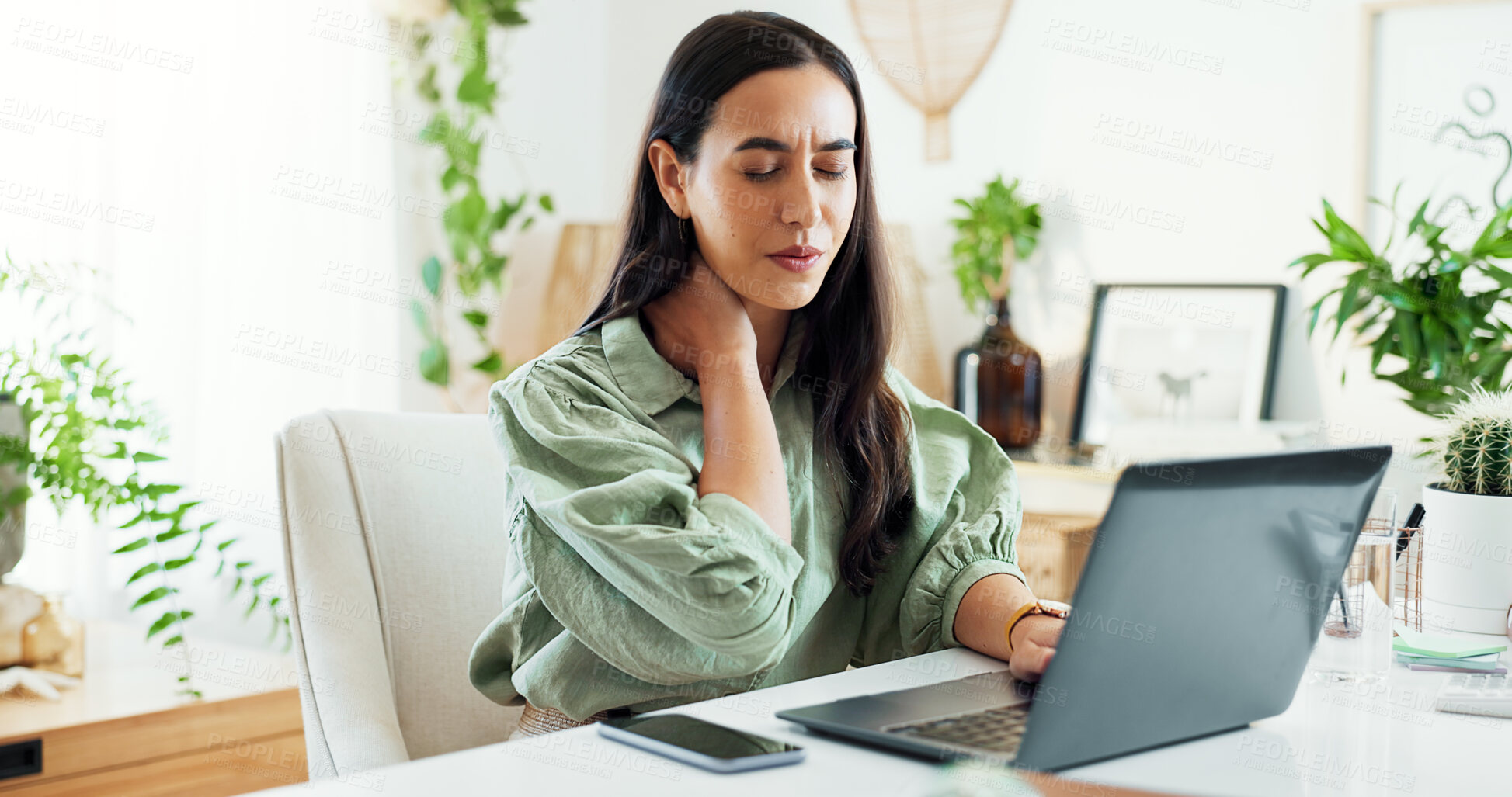 Buy stock photo Shoulder pain, woman and online with laptop, serious and burnout for project, tension and hurt in office. Digital, copywriting and person with injury, poor posture and stress of workload and ache