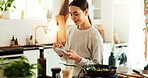 Woman, cooking and phone by stove in home for healthy salad recipe, meal prep and ingredients research. Nutrition influencer, food blogger or vegan chef with tech for social media tutorial in kitchen