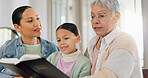 Grandmother, child and mom with bible in home for generations, worship and learning Christian religion. Family, women and girl with scripture in house for gospel, education or teaching of Holy Spirit