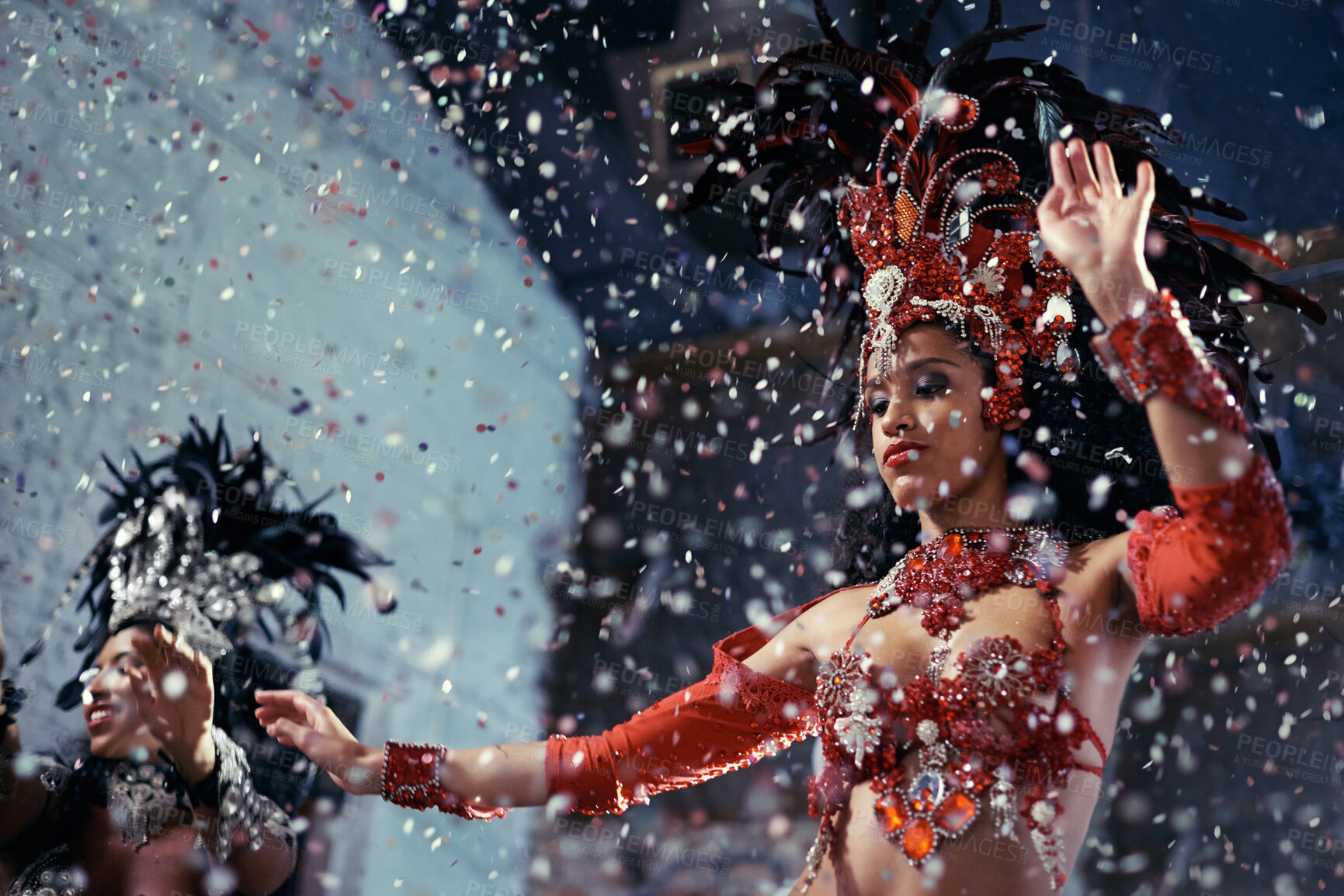 Buy stock photo Shot of two beautiful samba dancers performing in a carnival