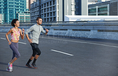 Buy stock photo Running, energy and training with couple in city for start of fitness, athlete and wellness. Race, exercise and marathon workout with people for urban, health and sports performance together