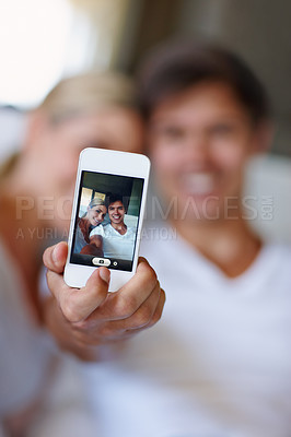 Buy stock photo Couple, mobile and selfie on bed for relax, bonding and live streaming with website, app and video. Man, woman and technology in home for relationship, memory and social media with profile picture