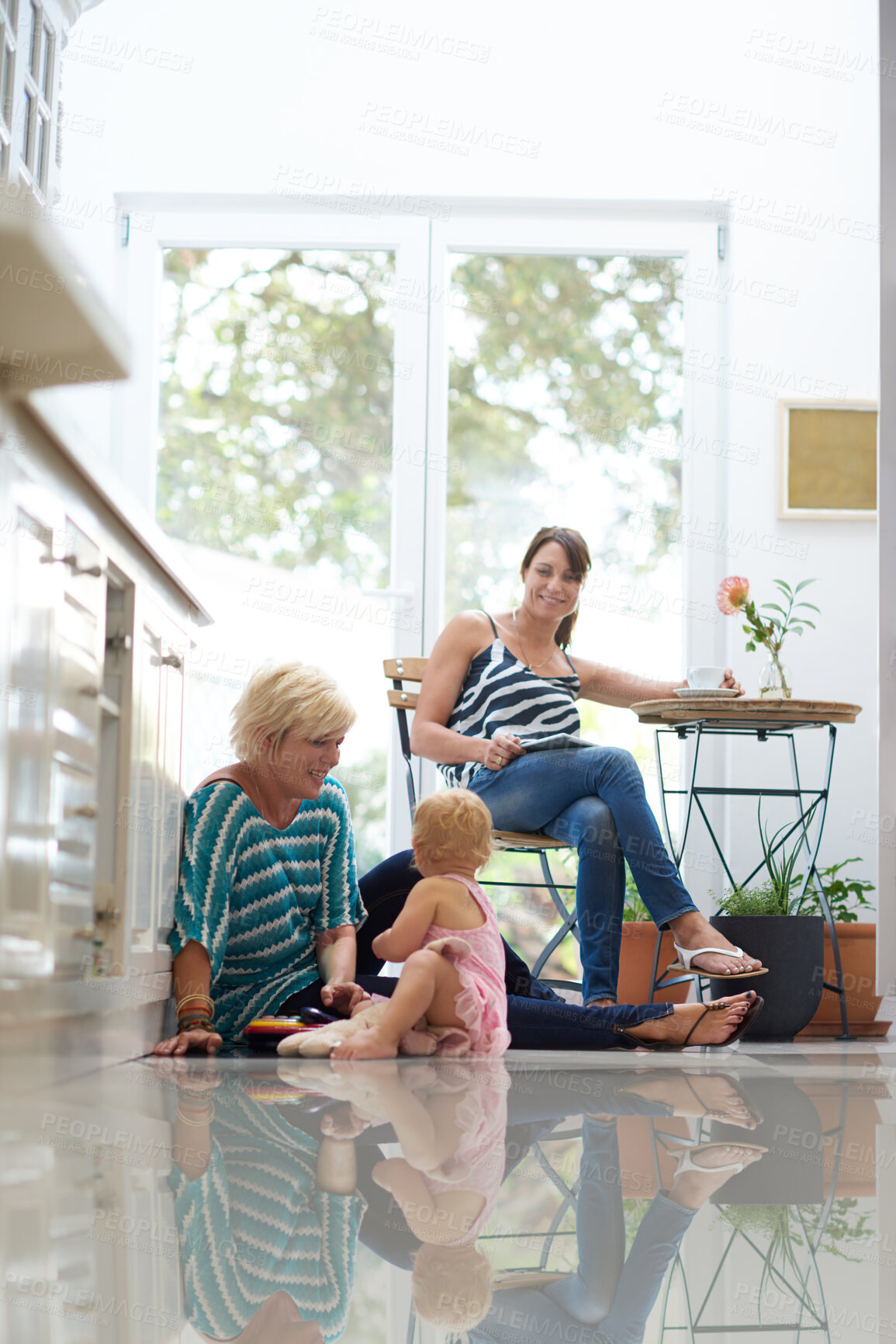 Buy stock photo Happy, lesbian and family with child at house for adoption commitment, playful love and relationship care. People, girl and relax for affection, bonding together and lgbtq mothers for loyalty support