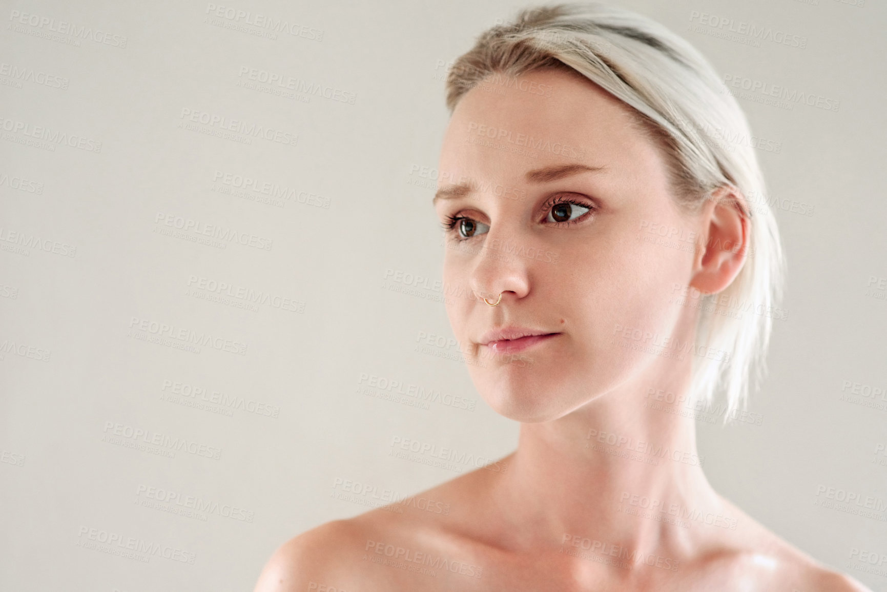 Buy stock photo Studio, woman and thinking with ideas for skincare, beauty treatment and smooth glow with confidence. Mockup space, female person and benefits with cosmetics for wellness, salon and white background