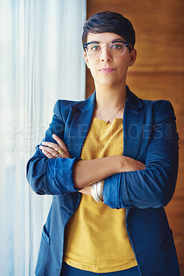 Buy stock photo Arms crossed, portrait and serious with designer woman in office for management or mission. Creative, glasses and professional with confident employee in agency or design workplace for startup