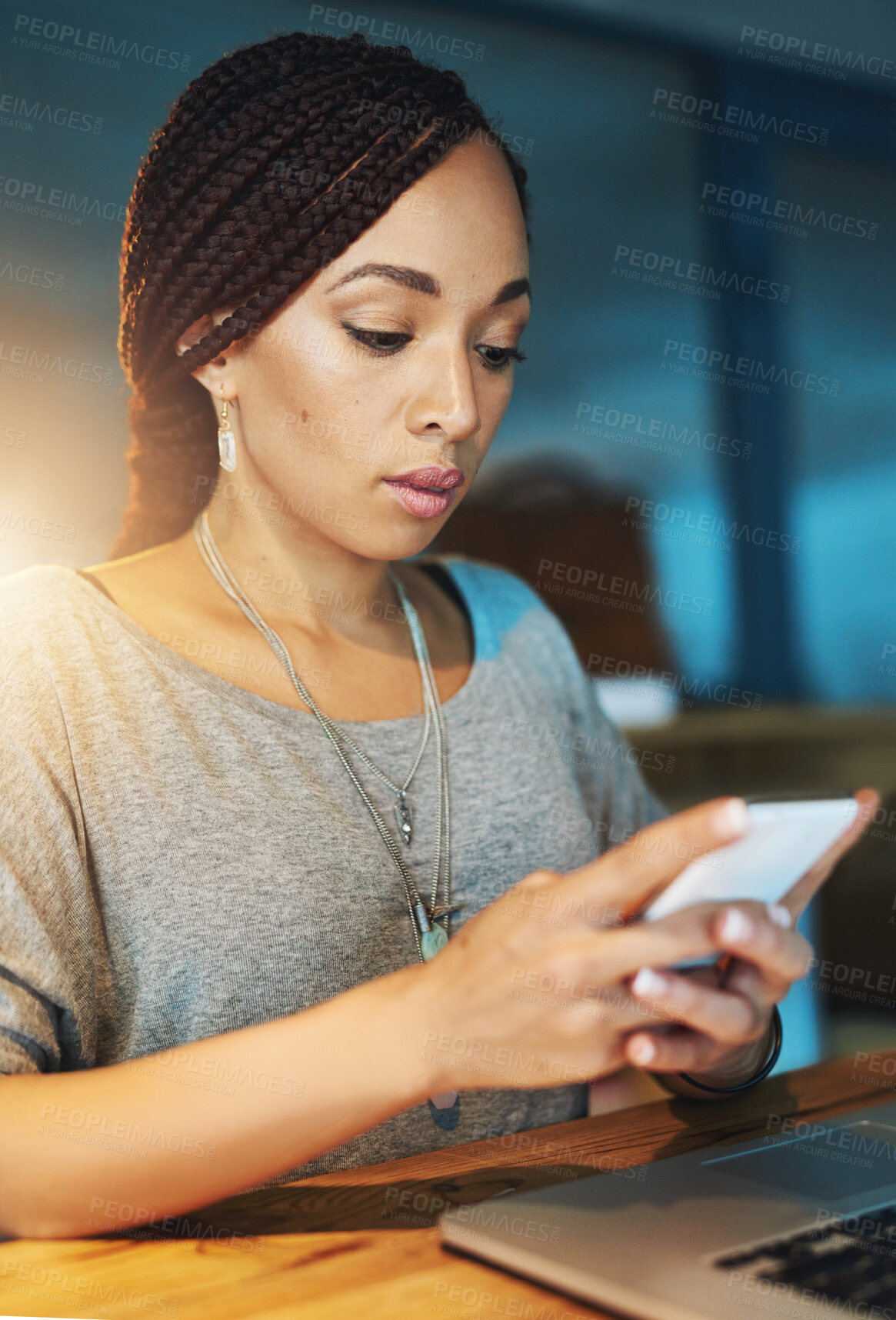 Buy stock photo Business, woman and phone in office at night with typing text message, reading notification and mobile chat. Professional, employee or technology at desk for social media scroll or search at overtime