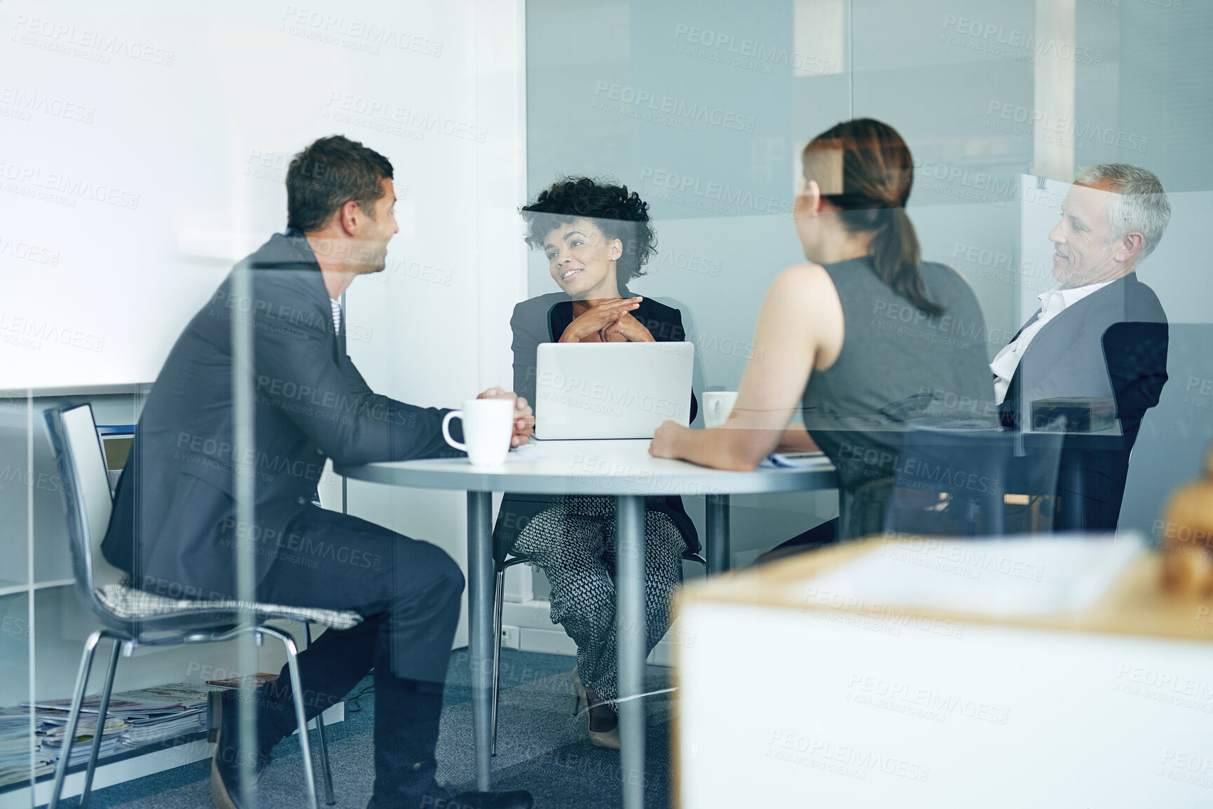 Buy stock photo Office, glass and meeting in boardroom, group and discussion with laptop, coffee and conversation. Corporate, talking and ideas with tech, publicist and planning for campaign and media relations