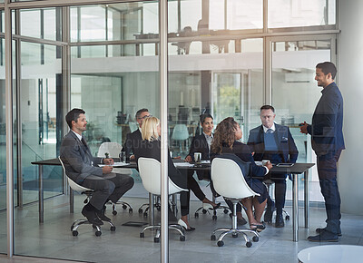 Buy stock photo Shot of businesspeople having a meeting in the office