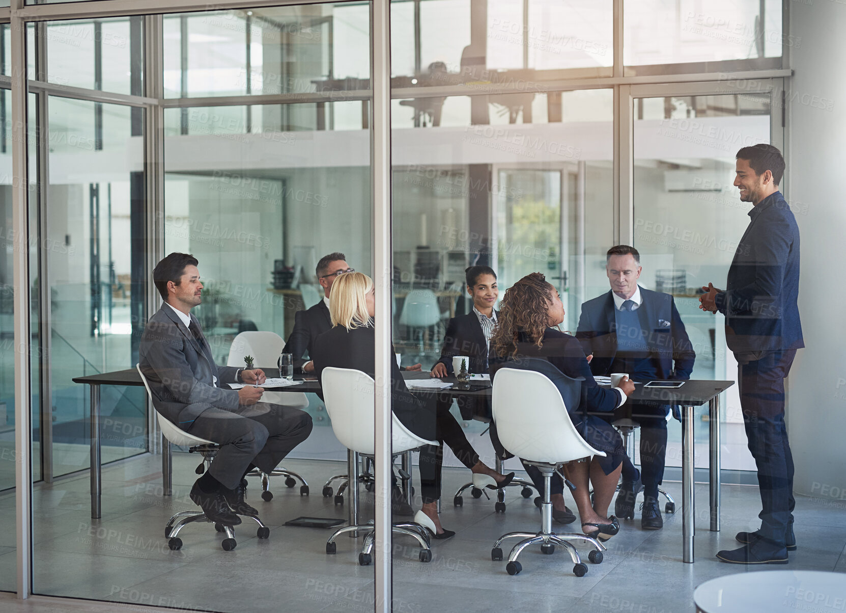 Buy stock photo Shot of businesspeople having a meeting in the office