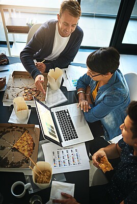 Buy stock photo Creative, laptop and business people in office with fast food, planning and collaboration from above. Eating, computer and team in workshop for development report, growth and data analysis in meeting