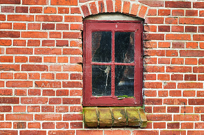 Buy stock photo Old building, broken glass and window with brick wall in city, ghost town and abandoned house. Crack, home exterior and facade of vintage architecture with grunge graffiti, moss and poor property