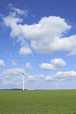Buy stock photo Clouds, earth and sky with wind turbine for renewable energy outdoor to produce electricity. Landscape, nature and recycling with windmill in nature environment for conservation or power supply